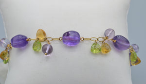 14K yellow gold 7" bracelet with Amethyst, Peridot and Citrine dangles from the gold links