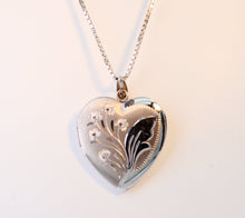 14K white gold locket with floral design on front