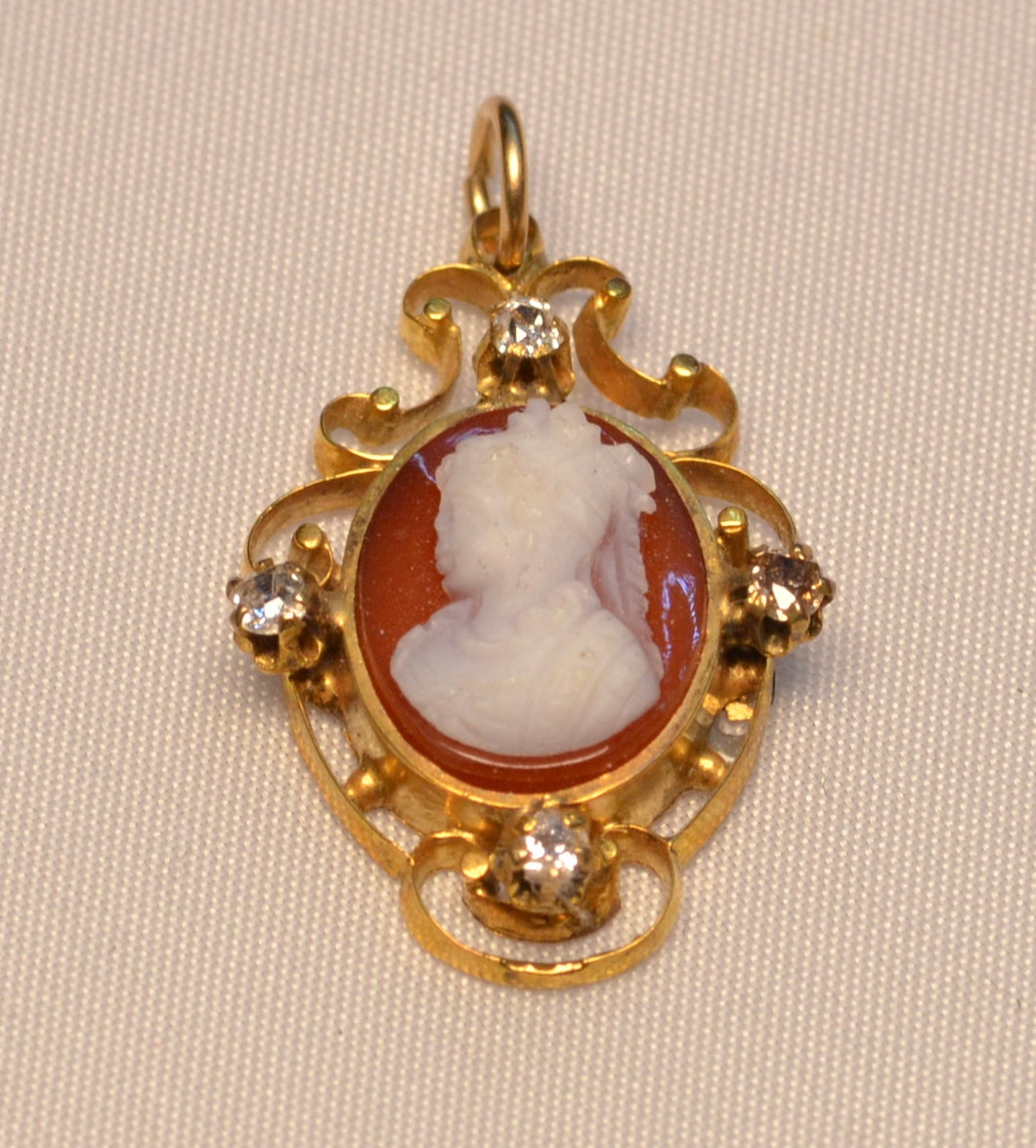 14K yellow gold hard stone cameo pendant with four old cut diamonds