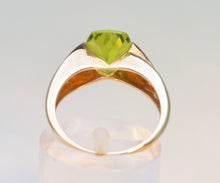 Faceted Peridot and Diamond Ring