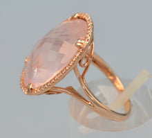 14K rose gold ring with transparent rose quartz framed with diamonds