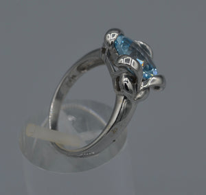 14K white gold, criss-cross cut cushion shaped Blue Topaz Ring