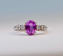 14K white gold ring with one oval Pink Sapphire and 4 Diamonds