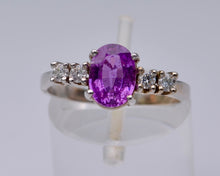 14K white gold ring with one oval Pink Sapphire and 4 Diamonds