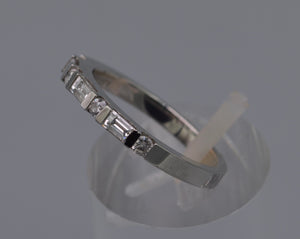 Platinum wedding band with baguette diamonds