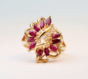14K yellow gold Ruby/Diamond cocktail ring with  11 Marquise-shaped Rubies and 3 Diamonds