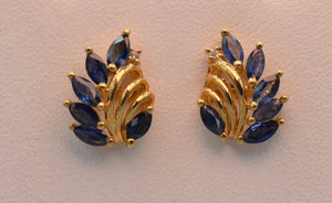 14K yellow gold blue sapphire post earrings with one diamond